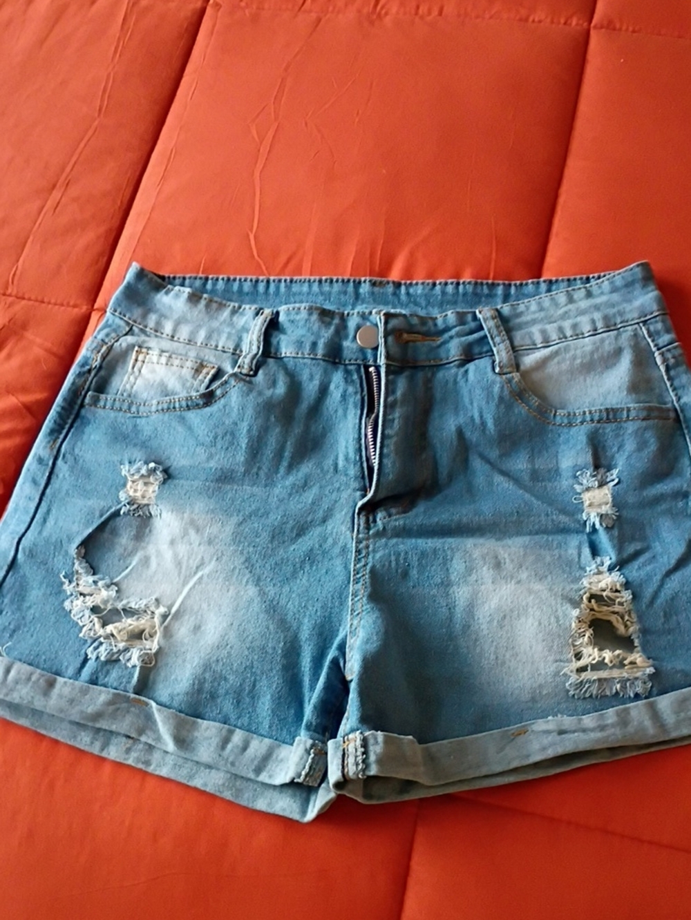 Women’s Distressed Light Blue Denim Shorts
